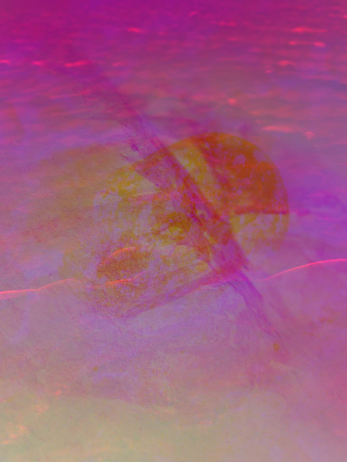 A digital collage consisting of multiple layers of photographs in an array of hyper-realistic colours. A close-up, inverted image of a large rock can be seen. Behind this is an image of the wet, sandy surface of a beach.